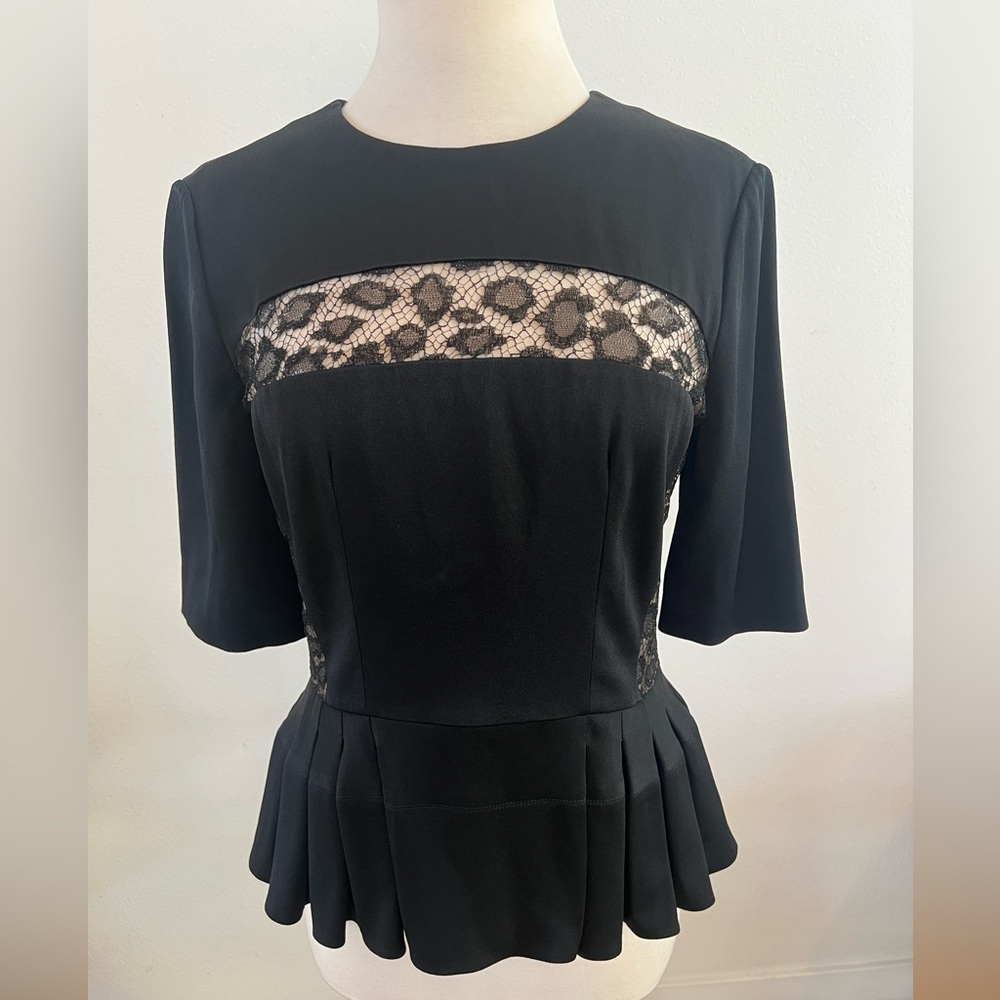 Brand New Alexander McQueen Black Leopard  Lace Peplum Blouse. Size 8 / 10. IT46